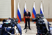 Russian President Putin attends a press conference in Astana