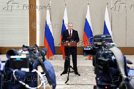 Russian President Putin attends a press conference in Astana