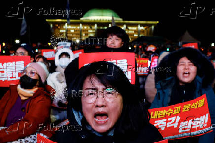 Protesters take part in a rally calling for the impeachment of South Korean President Yeol, in Seoul