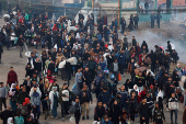 Displaced Palestinians wait to be allowed to return to their homes in northern Gaza, in the central Gaza Strip