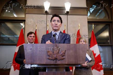 Canada's Prime Minister Justin Trudeau takes part in a press conference on Parliament Hill in Ottawa