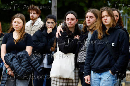 Fans gather and place tributes to former One Direction singer Liam Payne in Paris