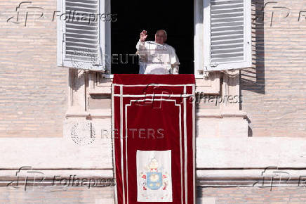 Pope Francis leads Angelus prayer from his window, at the Vatican