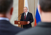 Russian President Putin attends a press conference in Astana