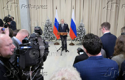 Russian President Putin attends a press conference in Leningrad region