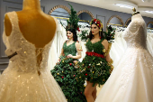 Models display Christmas and New Year-themed dresses at a wedding dress shop in Diyarbakir