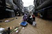 Red River overflows causing severe flooding in Hanoi following Typhoon Yagi