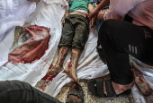 A Palestinian mother and her children killed following fresh Israeli strikes in central Gaza Strip