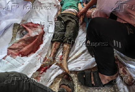 A Palestinian mother and her children killed following fresh Israeli strikes in central Gaza Strip