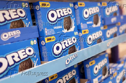 Oreo boxes are displayed on a shelf in a supermarket