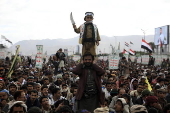 Houthi supporters protest againt the US and Israel in Sana'a