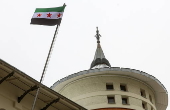 Syrian Embassy in Moscow flies the Syrian opposition flag