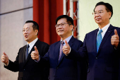 Incoming Defence Minister Wellington Koo, incoming Foreign Minister Lin Chia-lung and incoming National Security Council Secretary-General Joseph Wu give a thumbs up during a press conference, in Taipei