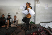 Gazans mourn loved ones killed in an Israeli strike