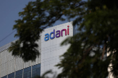 The logo of the Adani Group is seen on the facade of its Corporate House on the outskirts of Ahmedabad