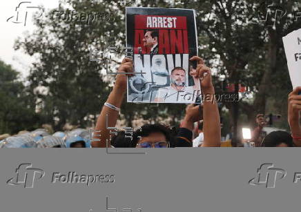 Student wing of the Indian National Congress protest against Indian industrialist Gautam Adani