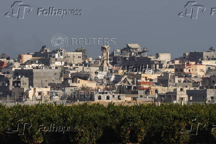 Buildings lie in ruin in the Gaza Strip, amid the ongoing conflict between Israel and Hamas, as seen from southern Israel