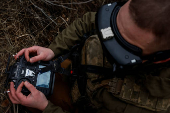 Ukrainian serviceman practice with an FPV drone, in Kharkiv region