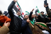 Celebrations in Paris after Syrian rebels capture Damascus and overthrow al-Assad