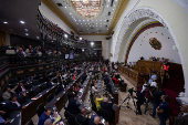 Members of the National Assembly attend a session in Caracas