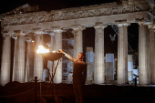 Olympic flame for Paris 2024 arrives at the Acropolis, in Athens