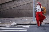 A man dressed as Santa Claus, who identifies as 