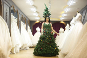 Models display Christmas and New Year-themed dresses at a wedding dress shop in Diyarbakir