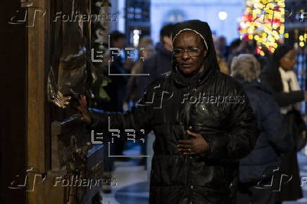 People walk through the Holy Door at Rome's Basilica of Saint Mary Major