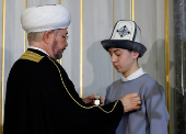 Boy awarded for saving dozens during attack on Moscow concert hall