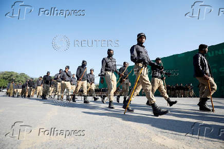 Members of police patrol to prevent an anti-government rally in Islamabad