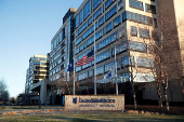 FILE PHOTO: Flags fly at half-staff outside of the office of UnitedHealthcare in Minnetonka