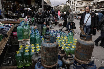 Containers filled with fuel sold on the black market in Damascus