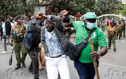 Kenyan activists and civil society representatives gather to deliver a list of people who disappeared during demonstrations against the government proposed tax hikes, in Nairobi