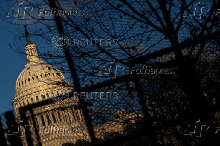 Security fencing encircles the U.S. Capitol building in Washington