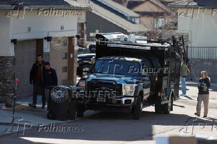 Investigators search a townhouse, in relation to the explosion in Las Vegas of a Tesla Cybertruck