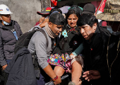 People protest against food shortages and rising prices in the food basket, in La Paz