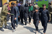 Shiite Muslims commemorate martyrdom of Imam Ali with mourning processions in Pakistan