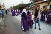 Catholics participate in the Los Cristos Procession in Izalco