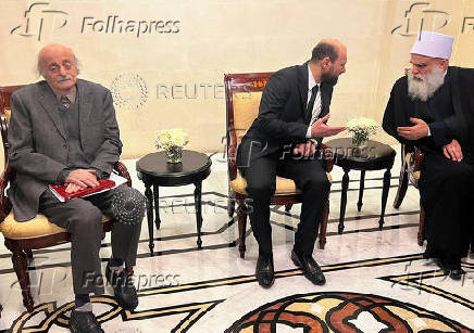 Lebanese Druze leader Walid Jumblatt meets with Syrian caretaker Prime Minister Mohammed al-Bashir in Damascus