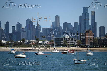 People relax on Melbourne St Kilda beach