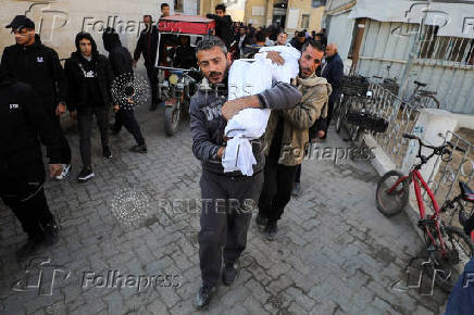 Palestinians mourn loved ones killed in Israeli strikes in Gaza