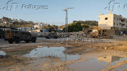 Israeli army vehicles are pictured in Tulkarm