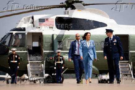 U.S. Democratic presidential nominee Kamala Harris walks to board Air Force Two at Joint Base Andrews in Maryland