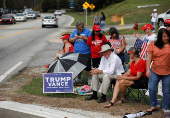 Republican presidential nominee Donald Trump and Georgia Governor Brian Kemp speak to the press about the impact of Hurricane Helene, in Evans