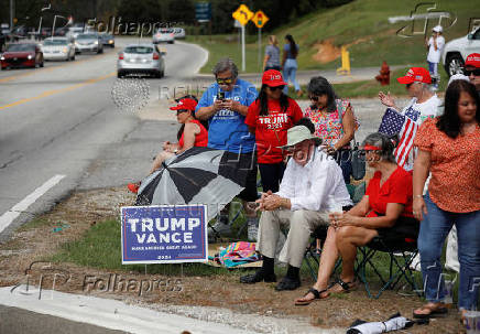 Republican presidential nominee Donald Trump and Georgia Governor Brian Kemp speak to the press about the impact of Hurricane Helene, in Evans