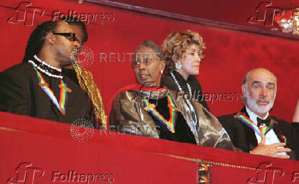 FILE PHOTO: Singer and songwriter Stevie Wonder (L) talks with dancer and teacher Judith Jamison as actor Sean C..