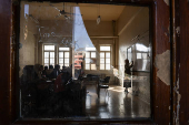 Students in a classroom after authorities announced the reopening of schools, in Damascus