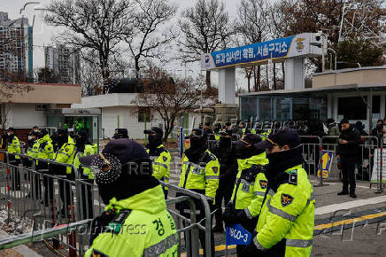 Police stand guard outside Seoul Detention Center where impeached South Korean President Yoon Suk Yeol is held in custody in Uiwang