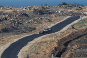 Israeli military vehicles manoeuvre inside the Gaza Strip, in southern Israel