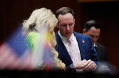 Arizona Republican state Rep. Matt Gress speaks to Alma Hernandez prior to the Republicans blocking the procedural vote to fast-track a repeal of the 1864 abortion ban